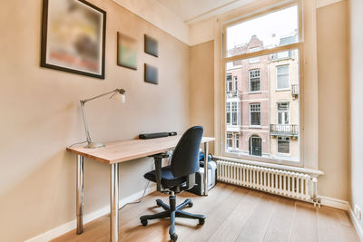 Empty chairs and table at home