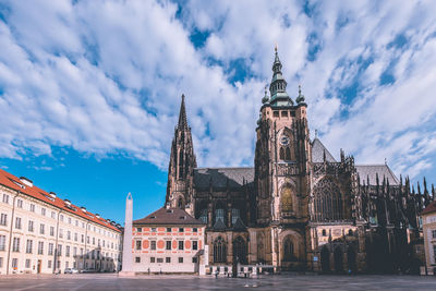 View of buildings in city against sky