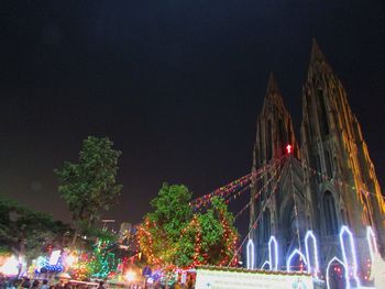 View of illuminated buildings at night