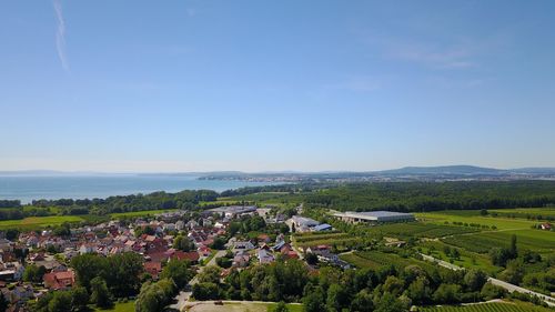High angle view of landscape against blue sky