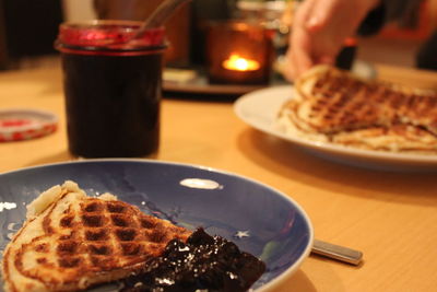 Close-up of breakfast served on table