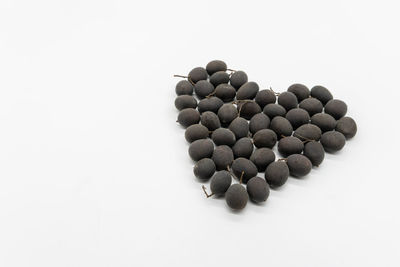 High angle view of eggs against white background