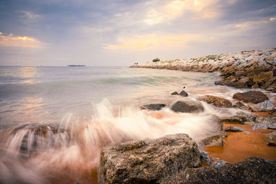 Scenic view of sea against sky during sunset