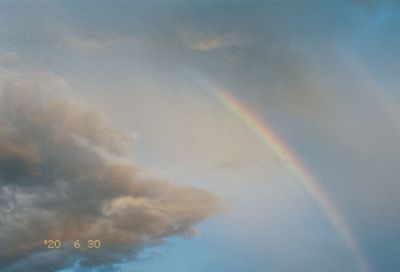 Low angle view of rainbow against sky