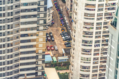 High angle view of street amidst buildings in city