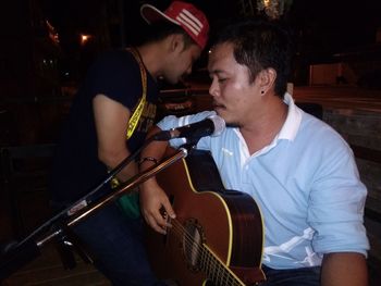 Young man playing guitar