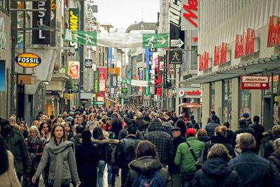 Crowd on street in city