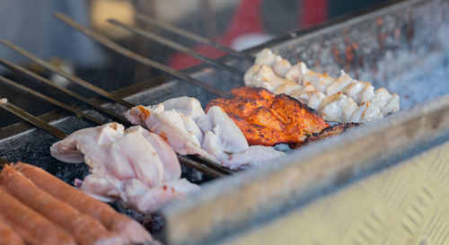 Cropped hand of person preparing food