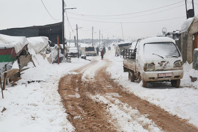 Snow covers syrian refugee tents near the turkish border.