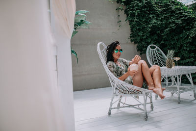 Woman sitting on chair