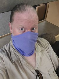 High angle portrait of man at home