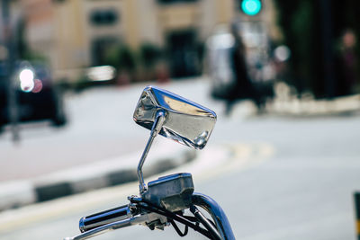 Close-up of bicycle on street