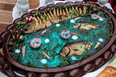 High angle view of fish on plate