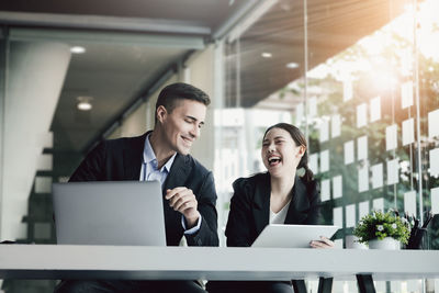 Business colleagues working in office