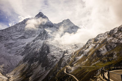 Scenic view of snowcapped mountains against sky