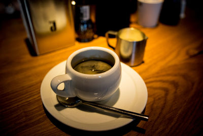 Close-up of coffee cup on table