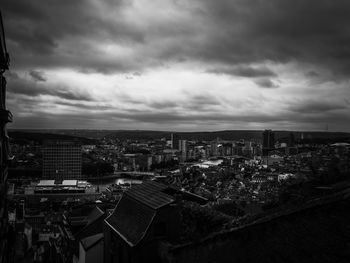 High angle view of illuminated city against sky