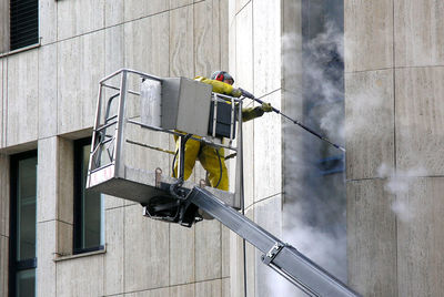 Man working on built structure