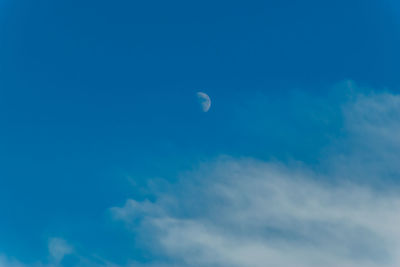 Low angle view of moon in sky