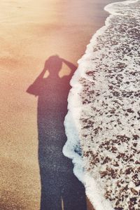 Shadow of person on snow