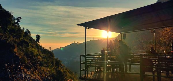 Scenic view of mountains against sky during sunset