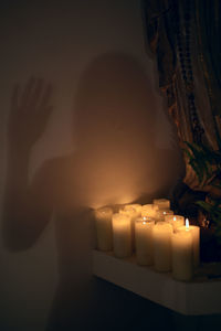 Close-up of illuminated candle