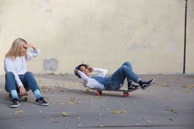 A young woman with a skateboard