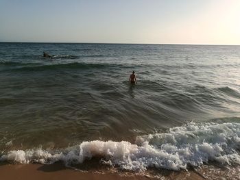 Scenic view of sea against clear sky