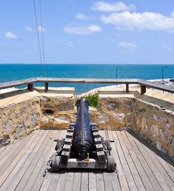 Cannon at round house against sky