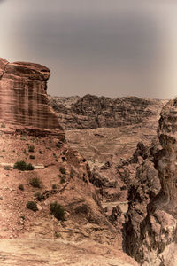 Rock formations in desert against sky