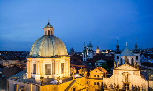 High angle view of church against blue sky