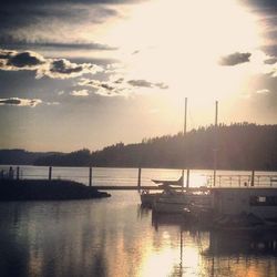 Scenic view of river at sunset