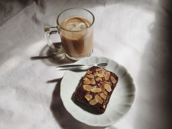 High angle view of coffee served on table