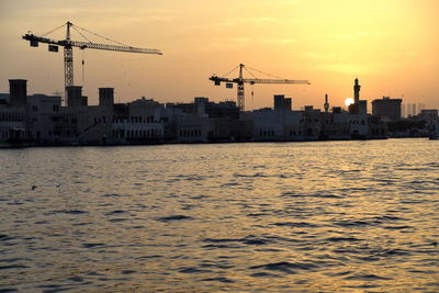 Dubai skyline from dubai creek harbour and dubai canal to downtown and business bay, uae