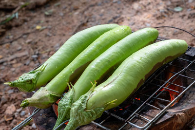 High angle view of green chili peppers