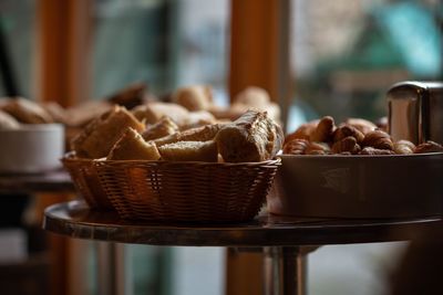 Close-up of bread in basket on table