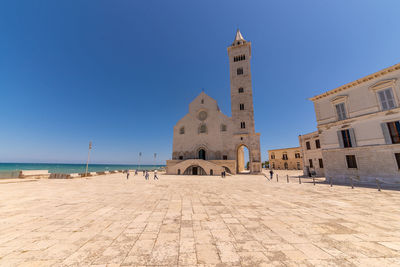 View of historic building against clear blue sky