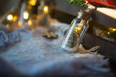 Close-up of wine bottles on table