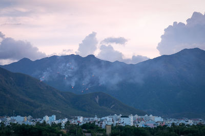 Townscape with mountain range in background