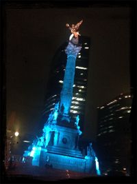 Low angle view of illuminated building at night