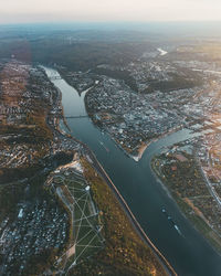 High angle view of river amidst buildings in city