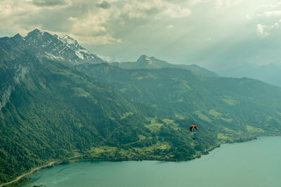 High angle view of person on mountains against sky