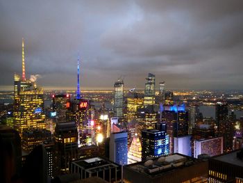 Illuminated buildings in city at night