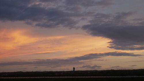 Scenic view of silhouette landscape against sky during sunset