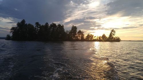 Scenic view of sea against sky at sunset