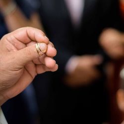 Close-up of couple holding hands