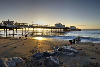 Scenic view of pier during sunset