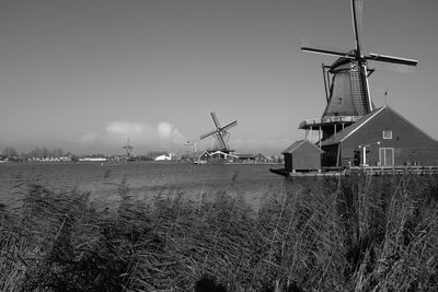 Traditional windmill against sky