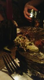 Close-up of woman on table