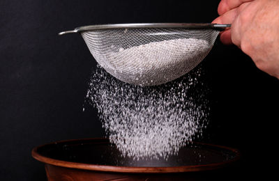 Close-up of man preparing food